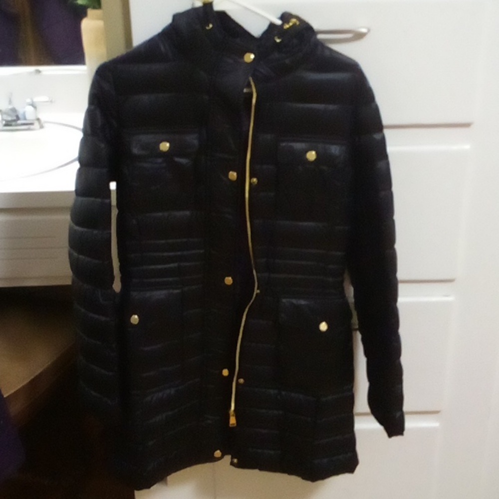 Very nice, gently used black and purple Bebe dress coat. Size small.